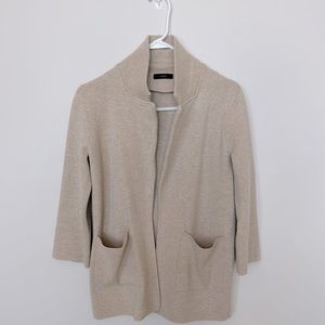 JCrew, light tan, sweater.  Three quarter length sleeves, high collar